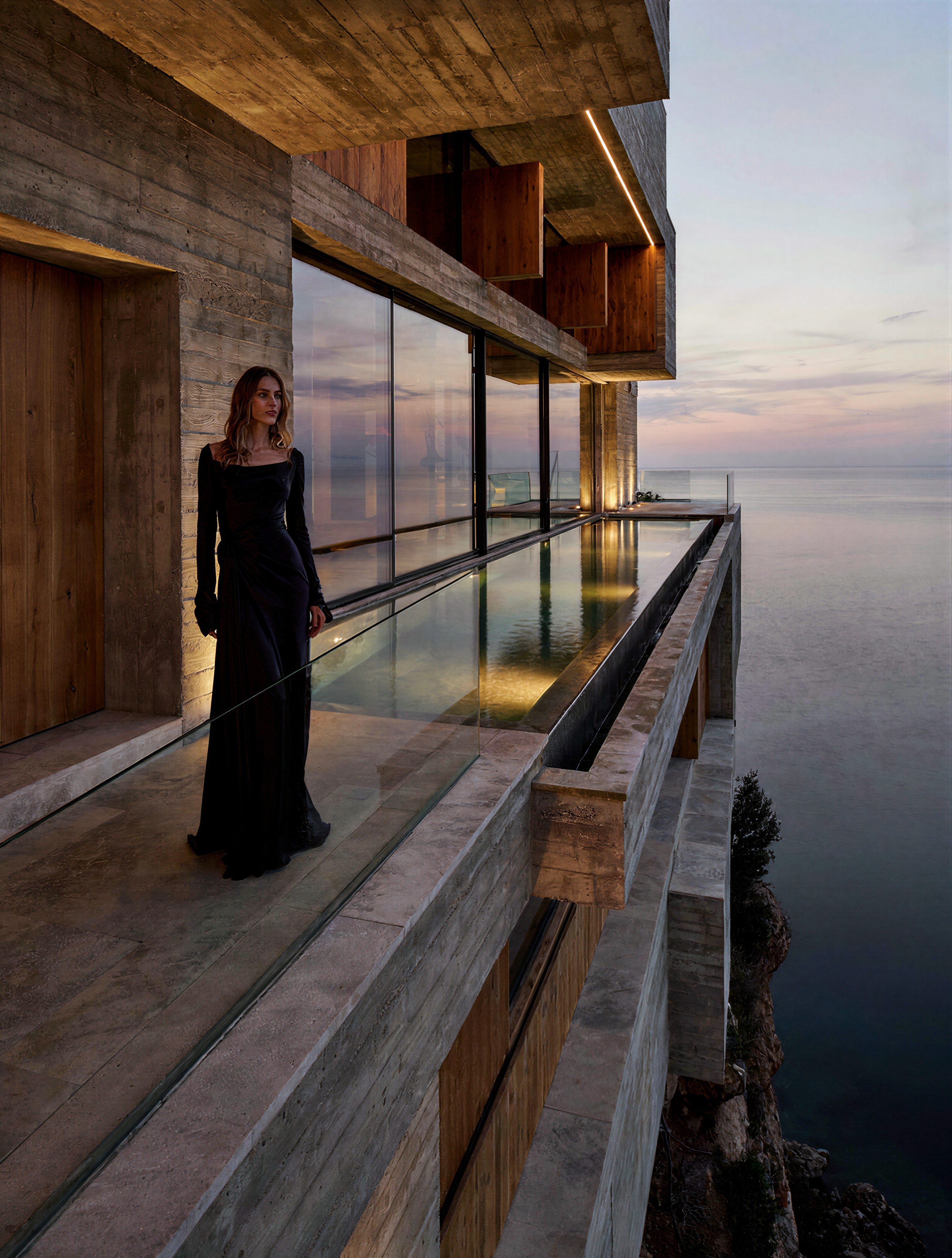 Minimalist Luxury Villa: Concrete, Glass, Teak at Cliffside Dusk — AI generated image