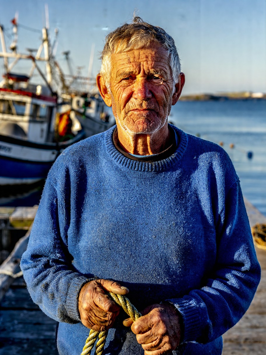 Elderly Fisherman at Dawn on Dock — AI generated image