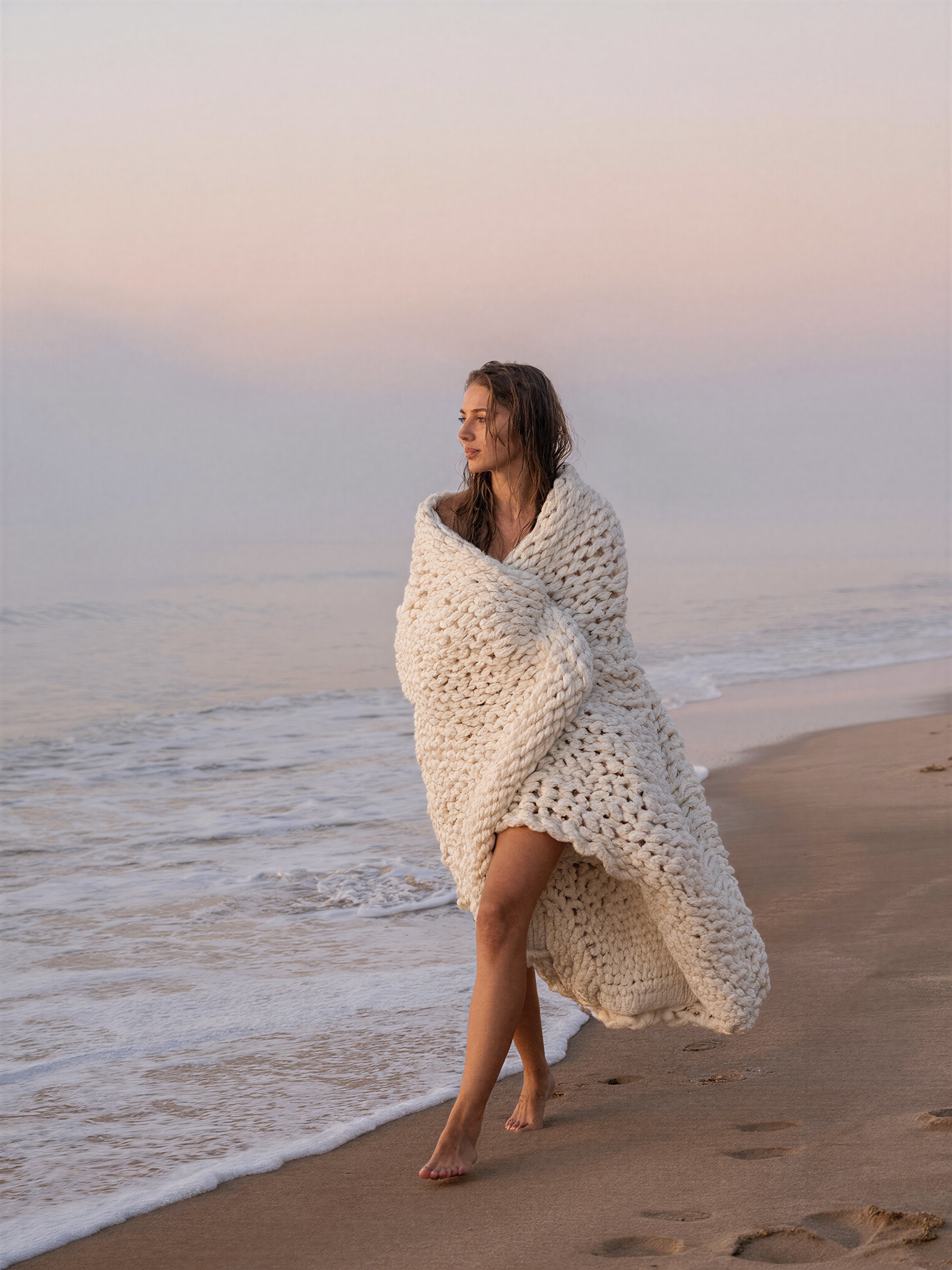Graceful Woman on Secluded Beach at Dawn — AI generated image