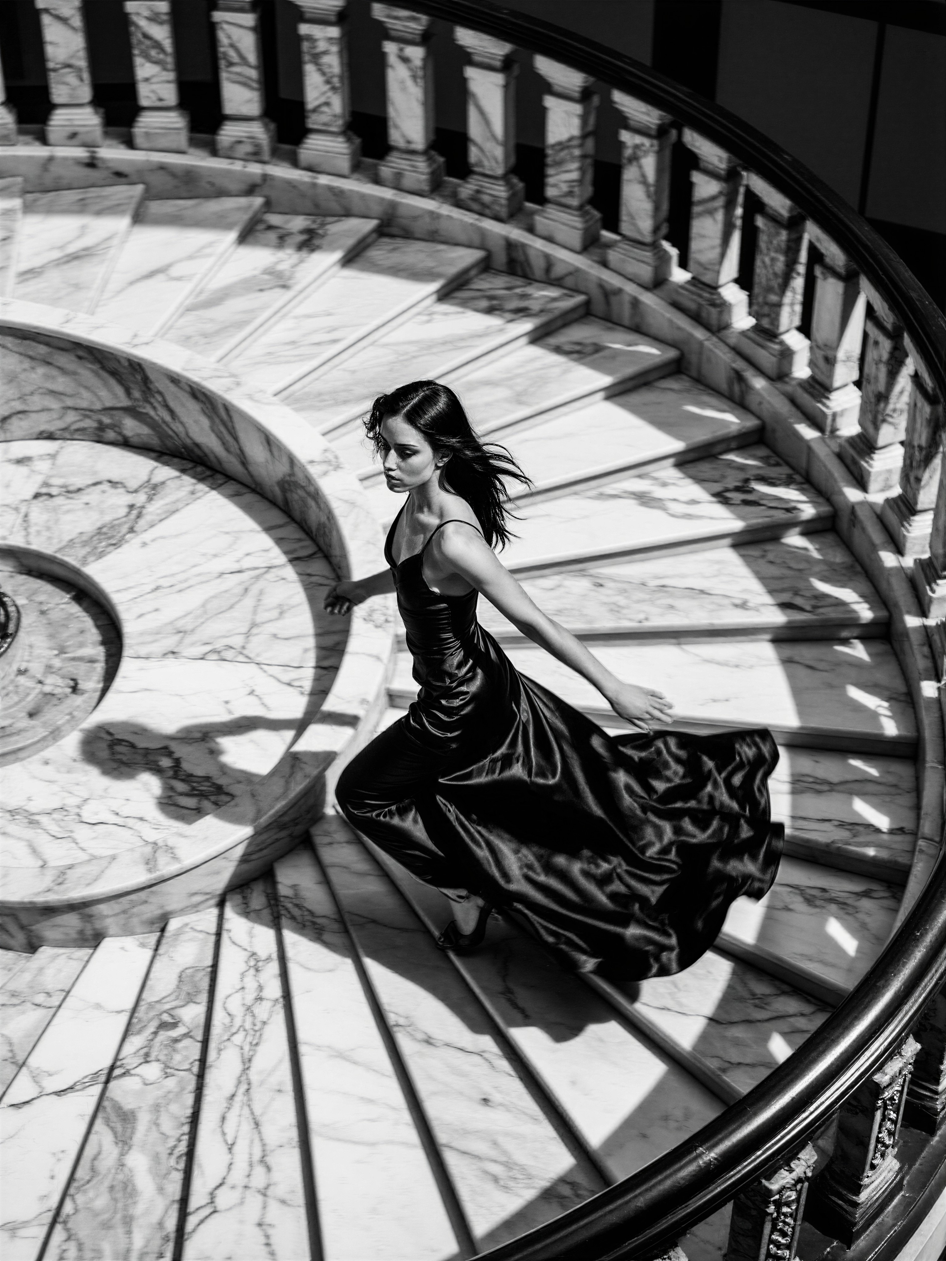 Elegant Woman in Motion on Marble Staircase — AI generated image