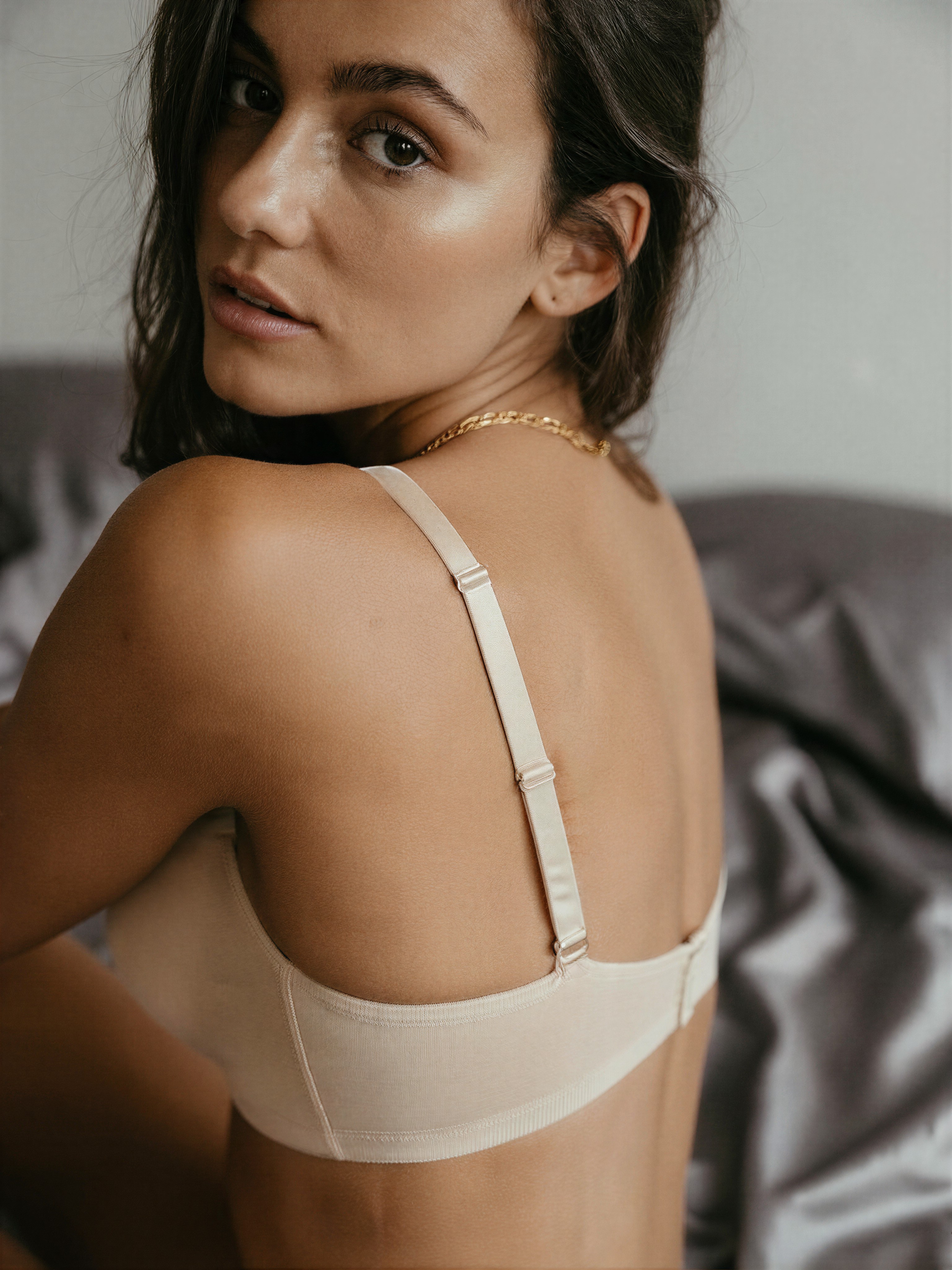 Intimate Back Close-Up, Soft Light, Elegant Boudoir — AI generated image