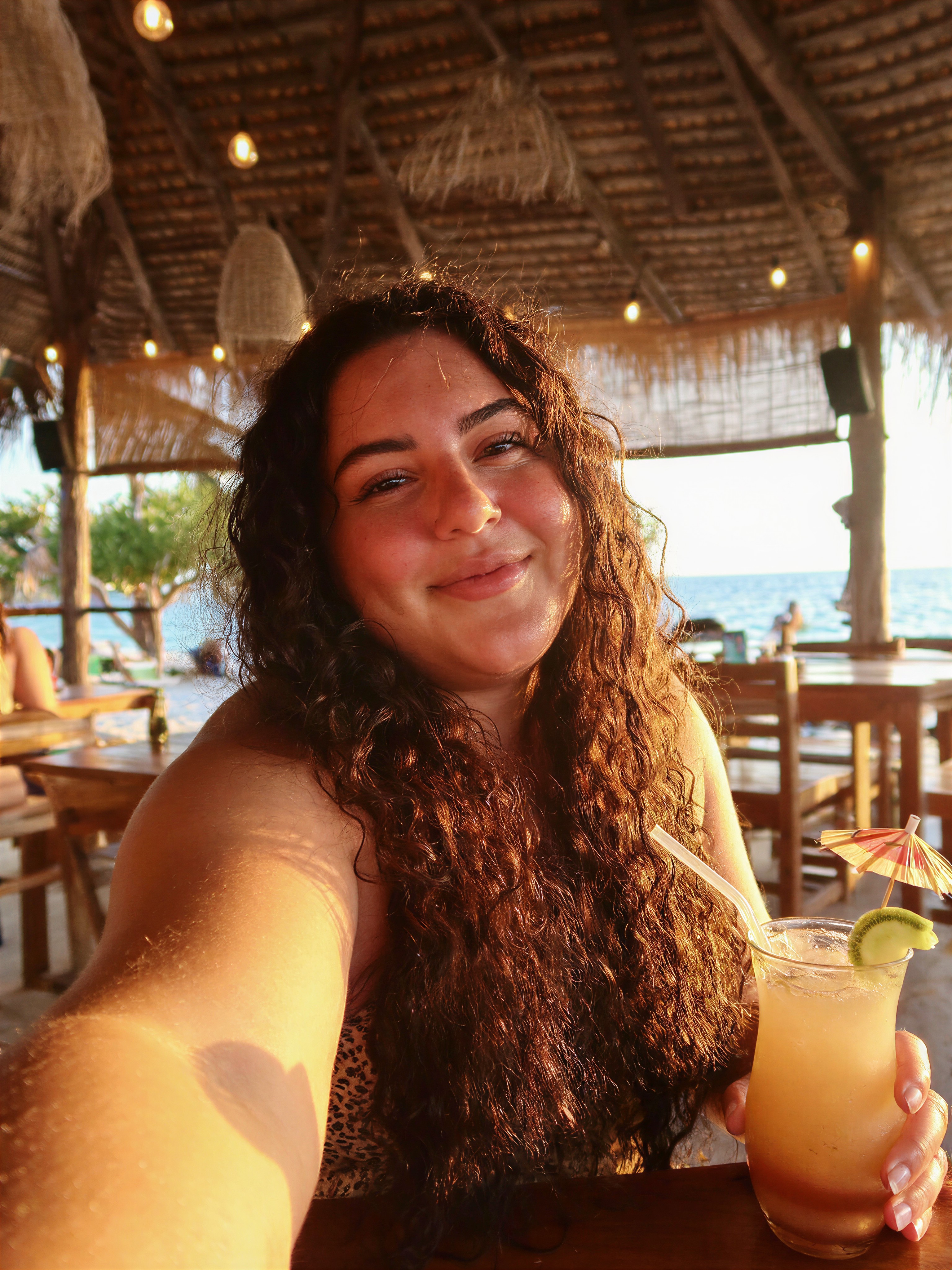 Cozy Sunset Selfie at Beach Cafe — AI generated image